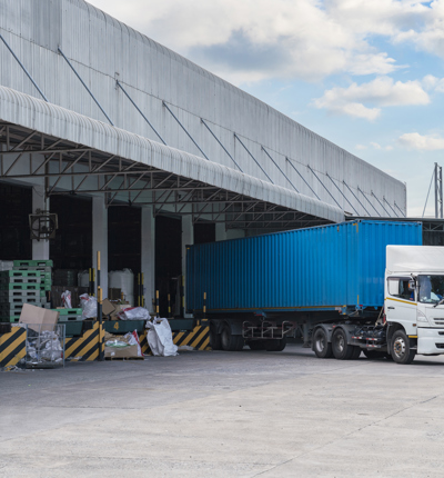 A lorry at a warehouse