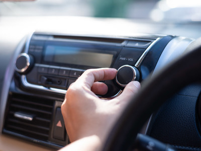 Adjusting radio in car