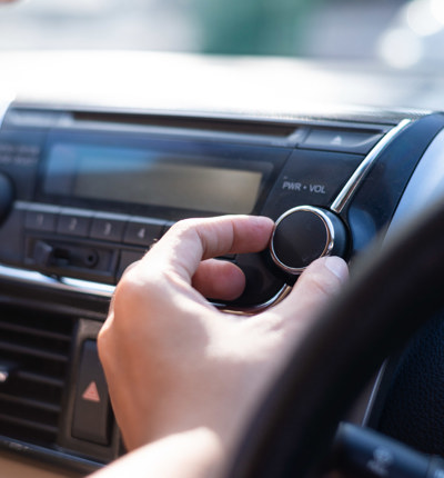Adjusting radio in car